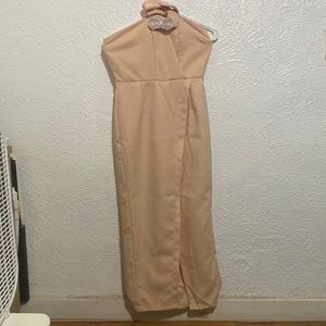 Long dress with front slit and open back.